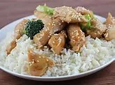 CHICKEN W. GARLIC SAUCE ON RICE