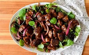 SLICED BEEF AND HOLLOW CRESS ON RICE
