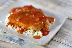 PORK CHOP W. TOMATO SAUCE ON RICE