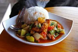 SLICED BEEF AND SOUR VEGETABLE ON RICE