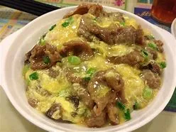BEEF W. EGG ON RICE