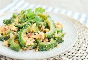 BITTER MELON , PICKLE AND EGG ON RICE