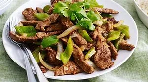 BEEF W. STATAY SAUCE ON RICE
