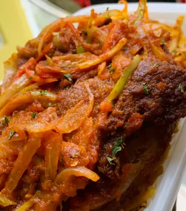 PEPPERED PORK WITH JOLLOF PASTA